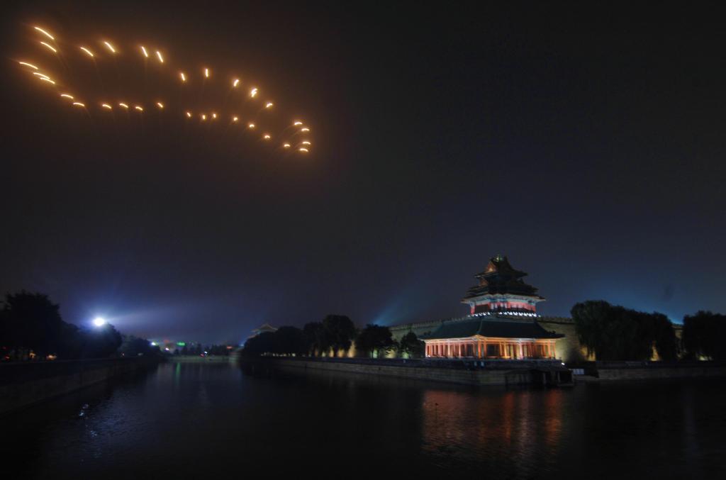 他用十余万张照片“对话”百年故宫